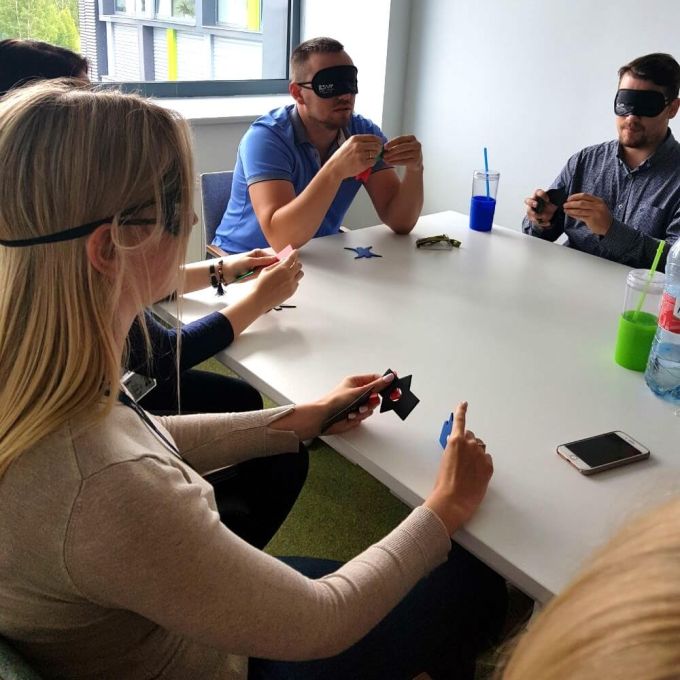 A group playing with Colourblind activity