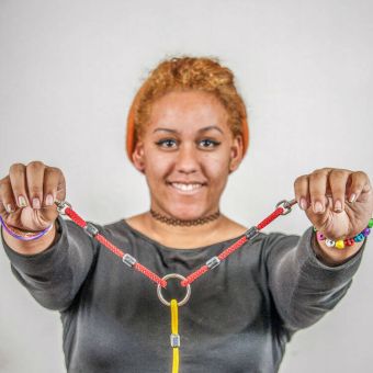 Participant holding rope for Webmaster experiential learning activity
